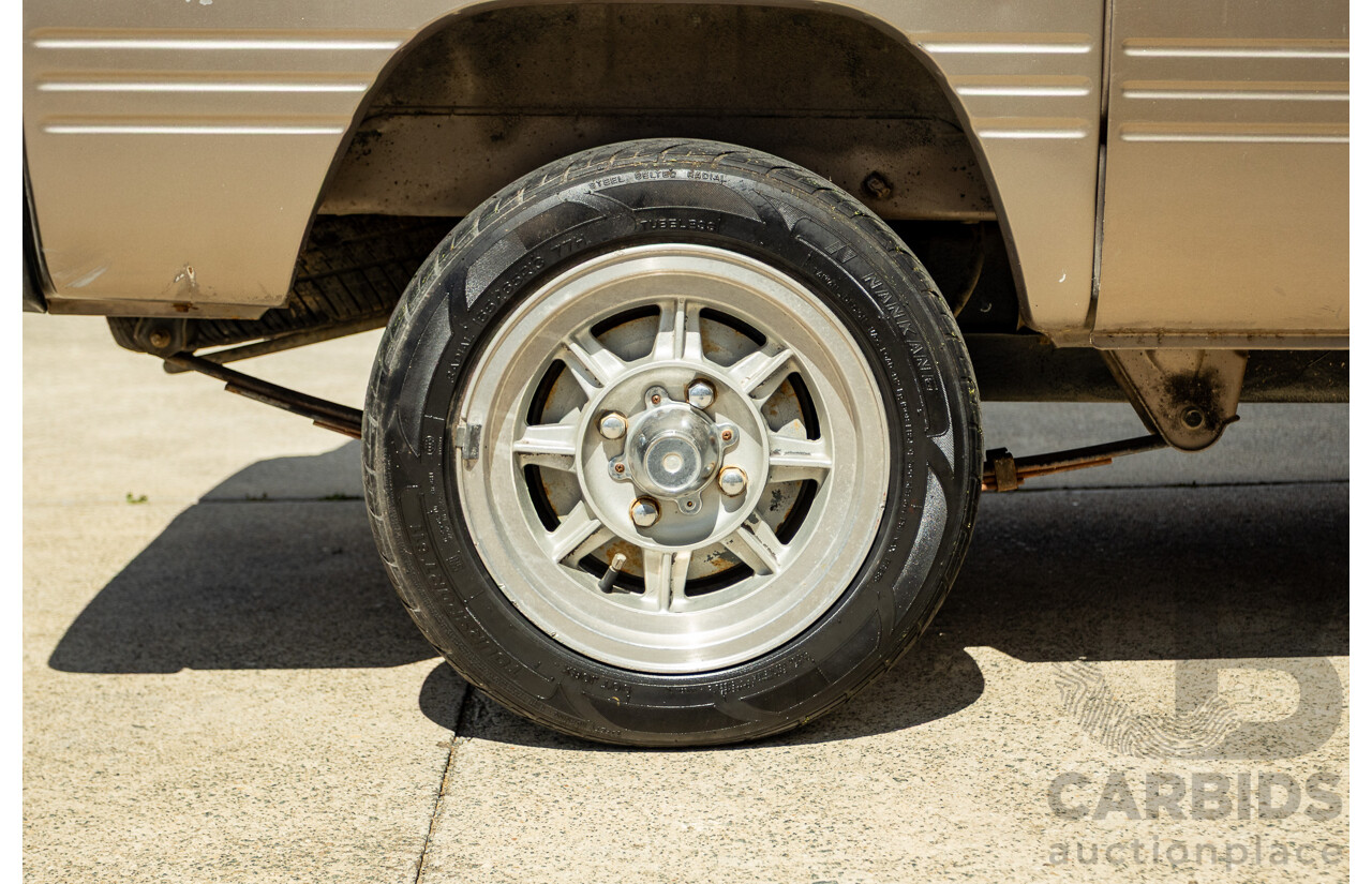 8/1987 Suzuki Super Carry Van DA21V 2d Van Brown 1.0L