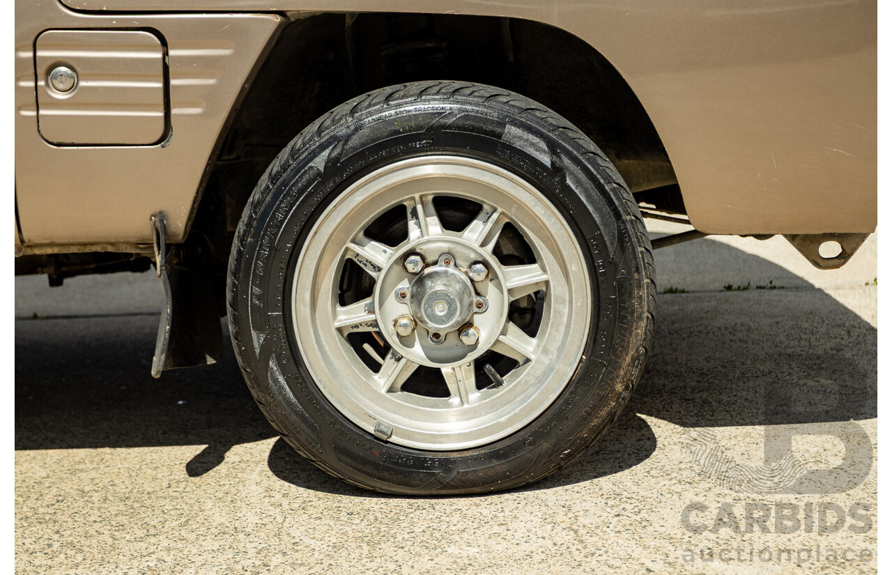 8/1987 Suzuki Super Carry Van DA21V 2d Van Brown 1.0L