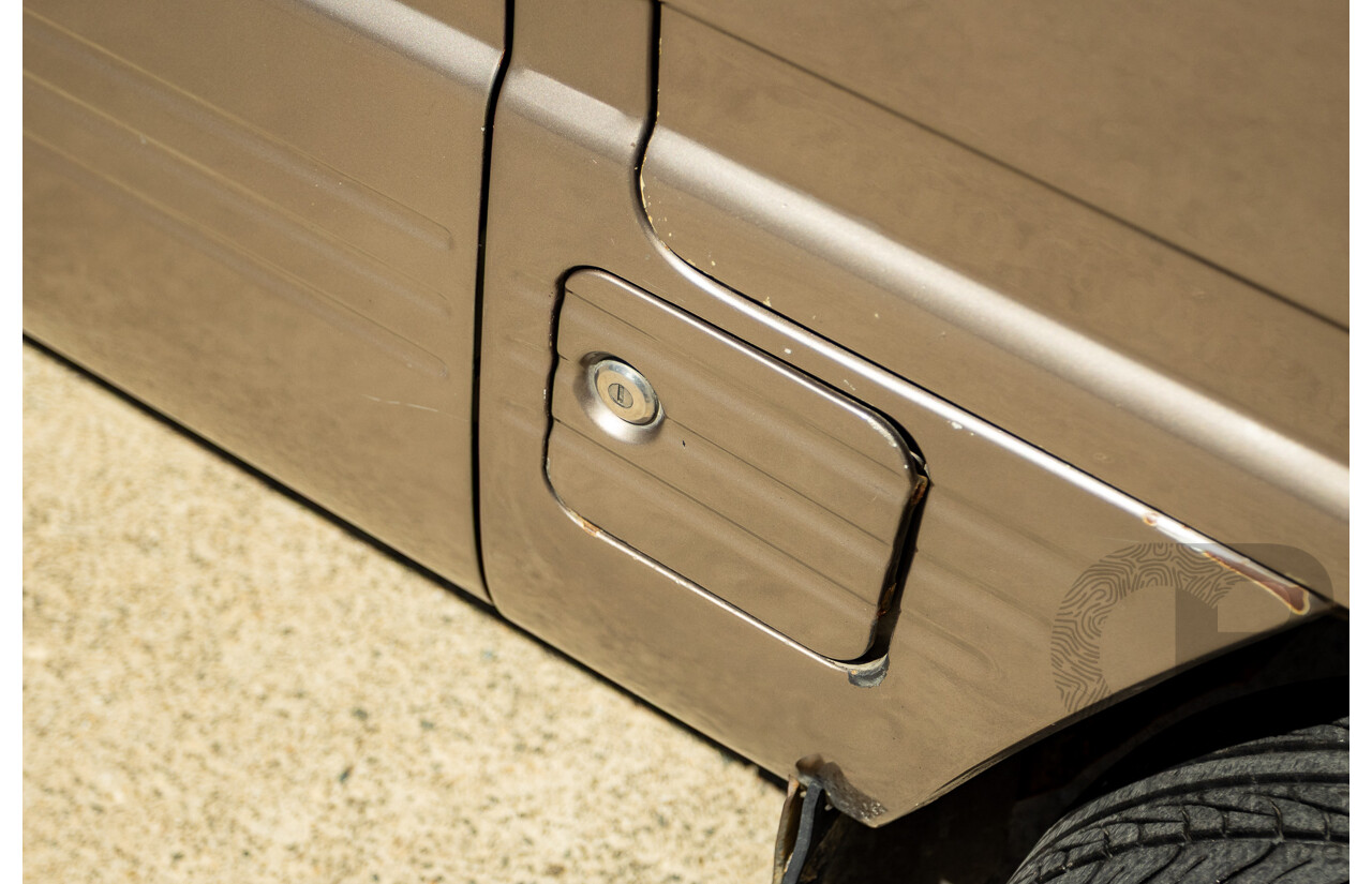 8/1987 Suzuki Super Carry Van DA21V 2d Van Brown 1.0L