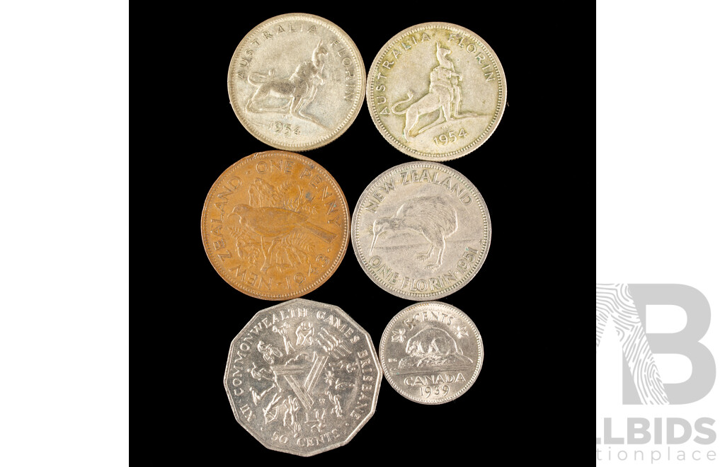Two Australian Silver QE2 Florins, 1954 Commemorative, 1982 Fifty Cent, Canada 1939 Five Cents, New Zealand 1951 Florin and 1943 Penny