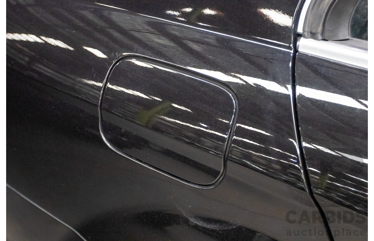 03/2009 Mercedes-Benz C63 AMG W204 4D Sedan Obsidian Black Metallic V8 6.2L