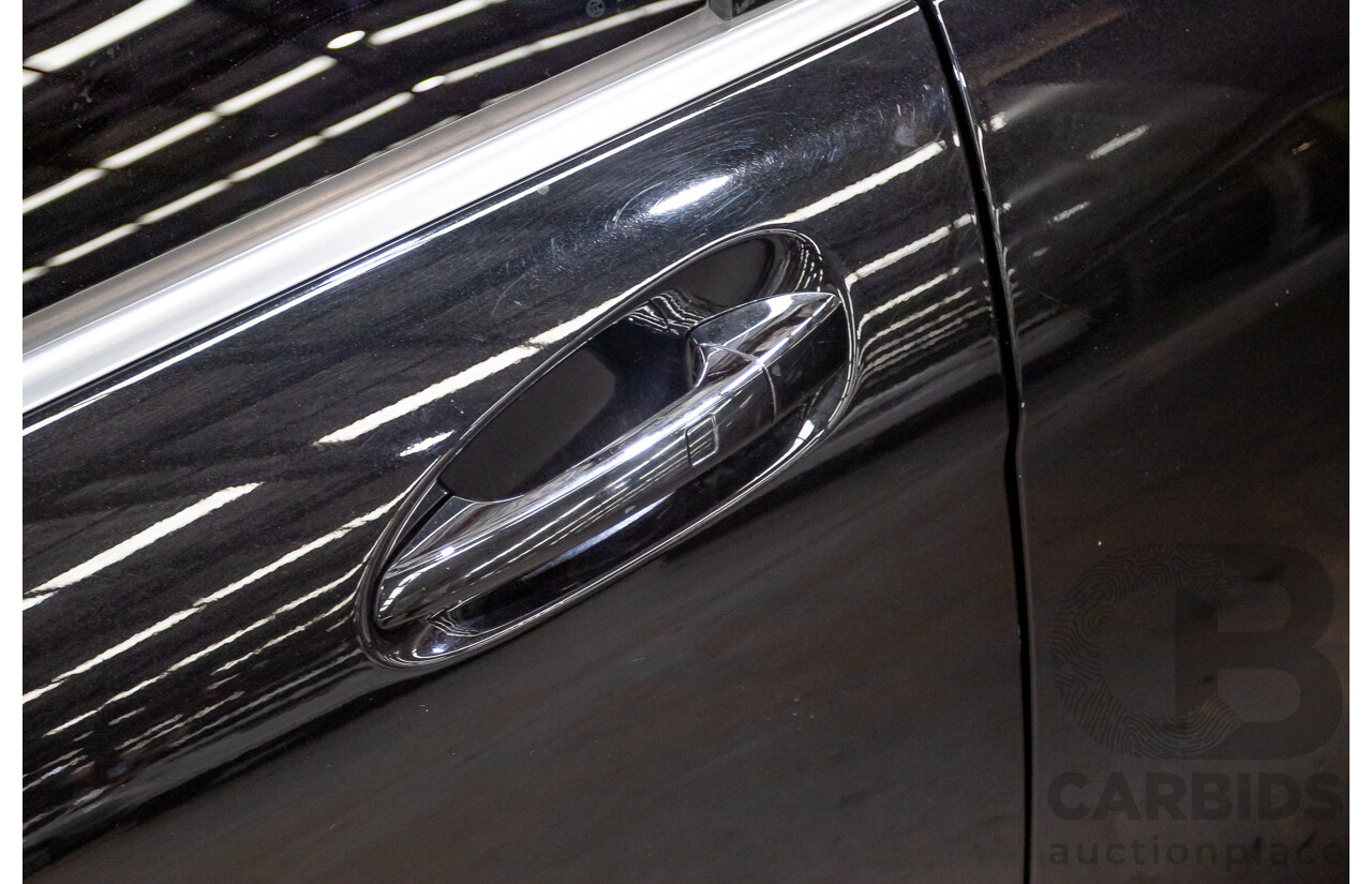 03/2009 Mercedes-Benz C63 AMG W204 4D Sedan Obsidian Black Metallic V8 6.2L