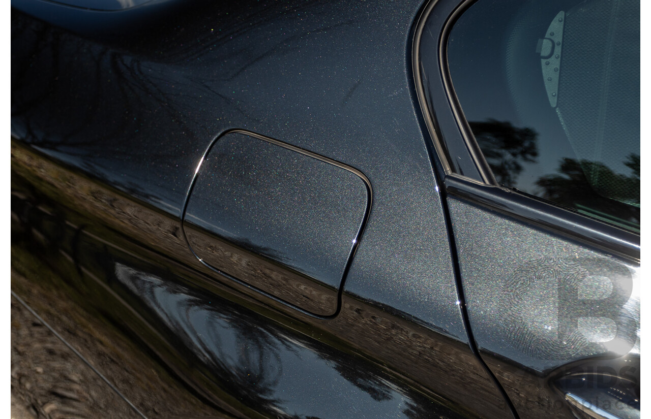 7/2012 BMW M5 F10 MY12 4d Sedan Sapphire Black Metallic Twin Turbo V8 4.4L