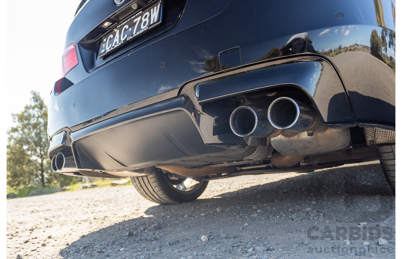7/2012 BMW M5 F10 MY12 4d Sedan Sapphire Black Metallic Twin Turbo V8 4.4L