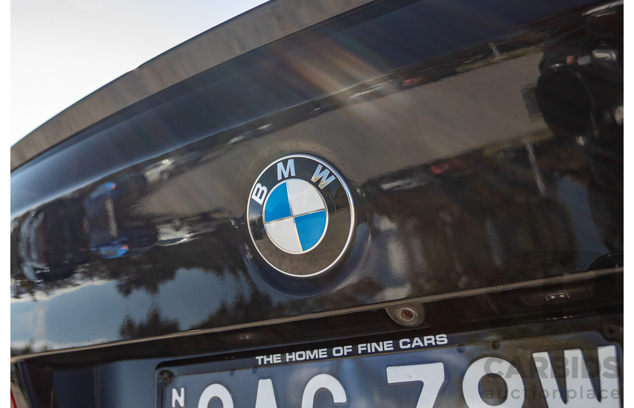 7/2012 BMW M5 F10 MY12 4d Sedan Sapphire Black Metallic Twin Turbo V8 4.4L