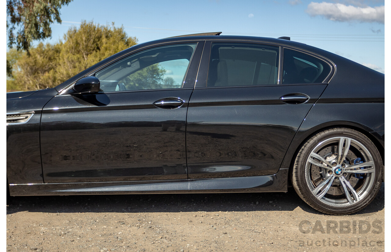 7/2012 BMW M5 F10 MY12 4d Sedan Sapphire Black Metallic Twin Turbo V8 4.4L
