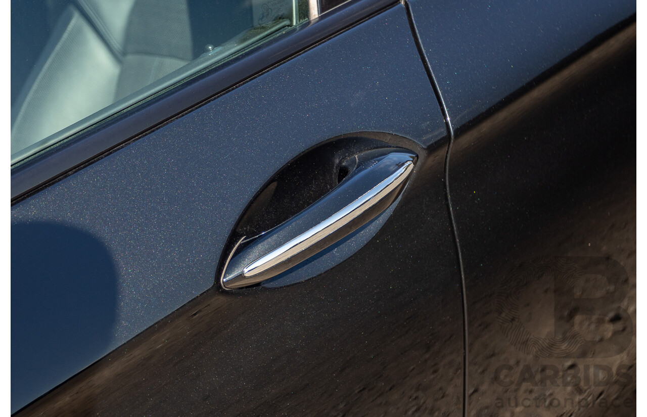 7/2012 BMW M5 F10 MY12 4d Sedan Sapphire Black Metallic Twin Turbo V8 4.4L