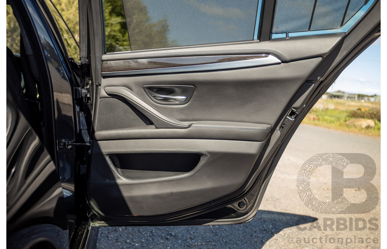 7/2012 BMW M5 F10 MY12 4d Sedan Sapphire Black Metallic Twin Turbo V8 4.4L