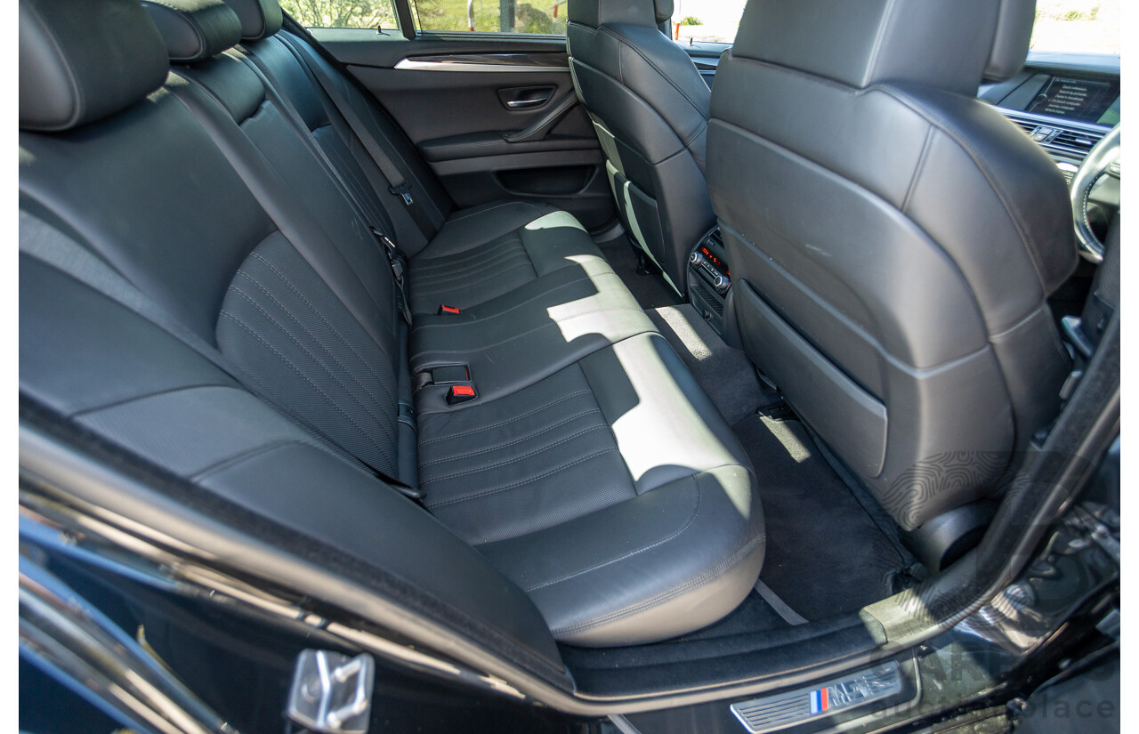 7/2012 BMW M5 F10 MY12 4d Sedan Sapphire Black Metallic Twin Turbo V8 4.4L