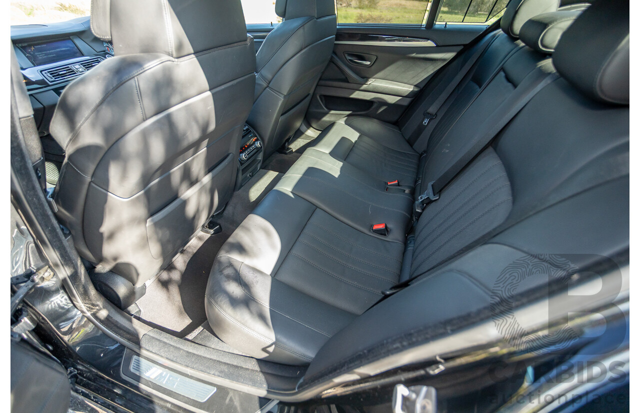 7/2012 BMW M5 F10 MY12 4d Sedan Sapphire Black Metallic Twin Turbo V8 4.4L