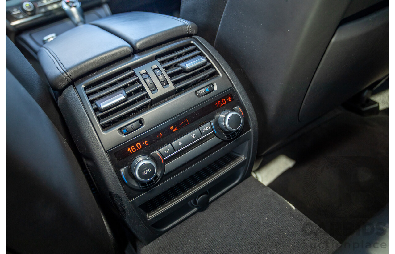 7/2012 BMW M5 F10 MY12 4d Sedan Sapphire Black Metallic Twin Turbo V8 4.4L