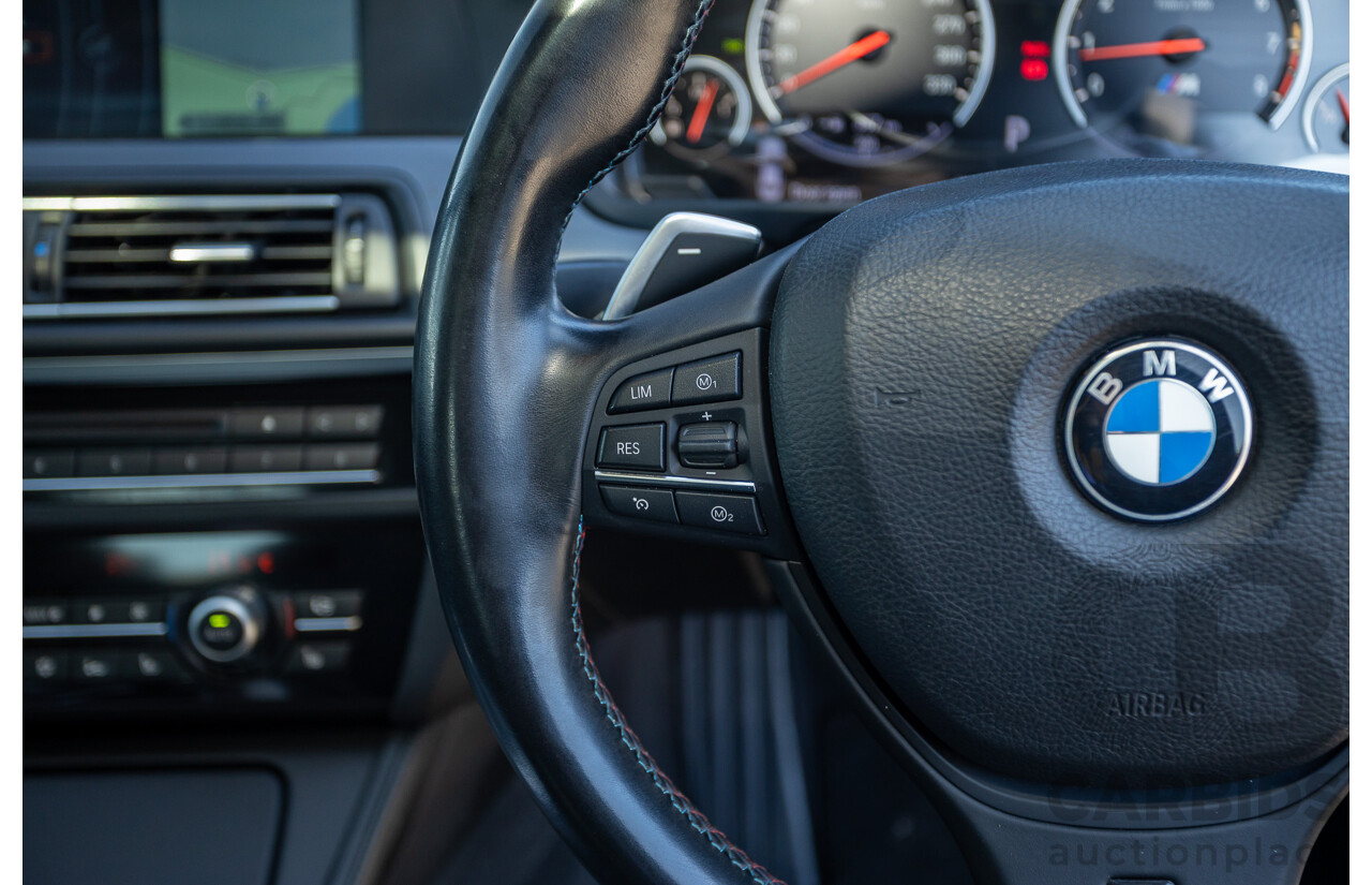 7/2012 BMW M5 F10 MY12 4d Sedan Sapphire Black Metallic Twin Turbo V8 4.4L
