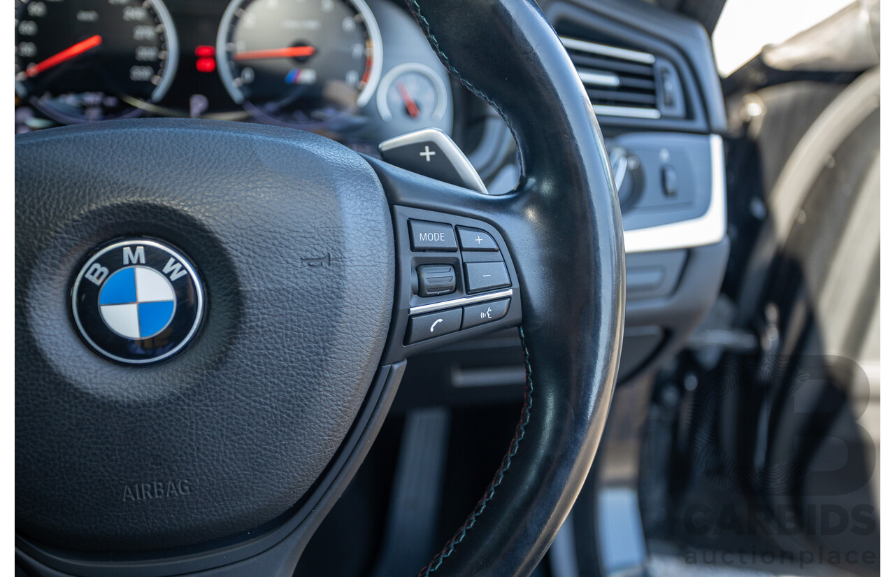 7/2012 BMW M5 F10 MY12 4d Sedan Sapphire Black Metallic Twin Turbo V8 4.4L