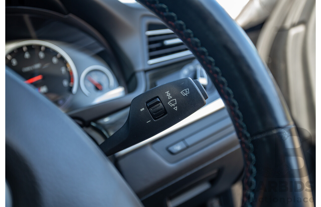 7/2012 BMW M5 F10 MY12 4d Sedan Sapphire Black Metallic Twin Turbo V8 4.4L