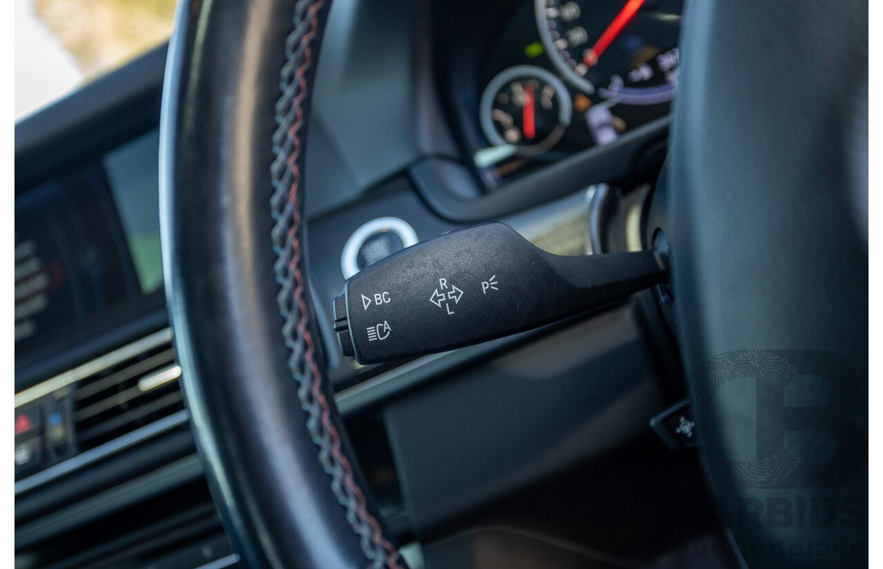 7/2012 BMW M5 F10 MY12 4d Sedan Sapphire Black Metallic Twin Turbo V8 4.4L