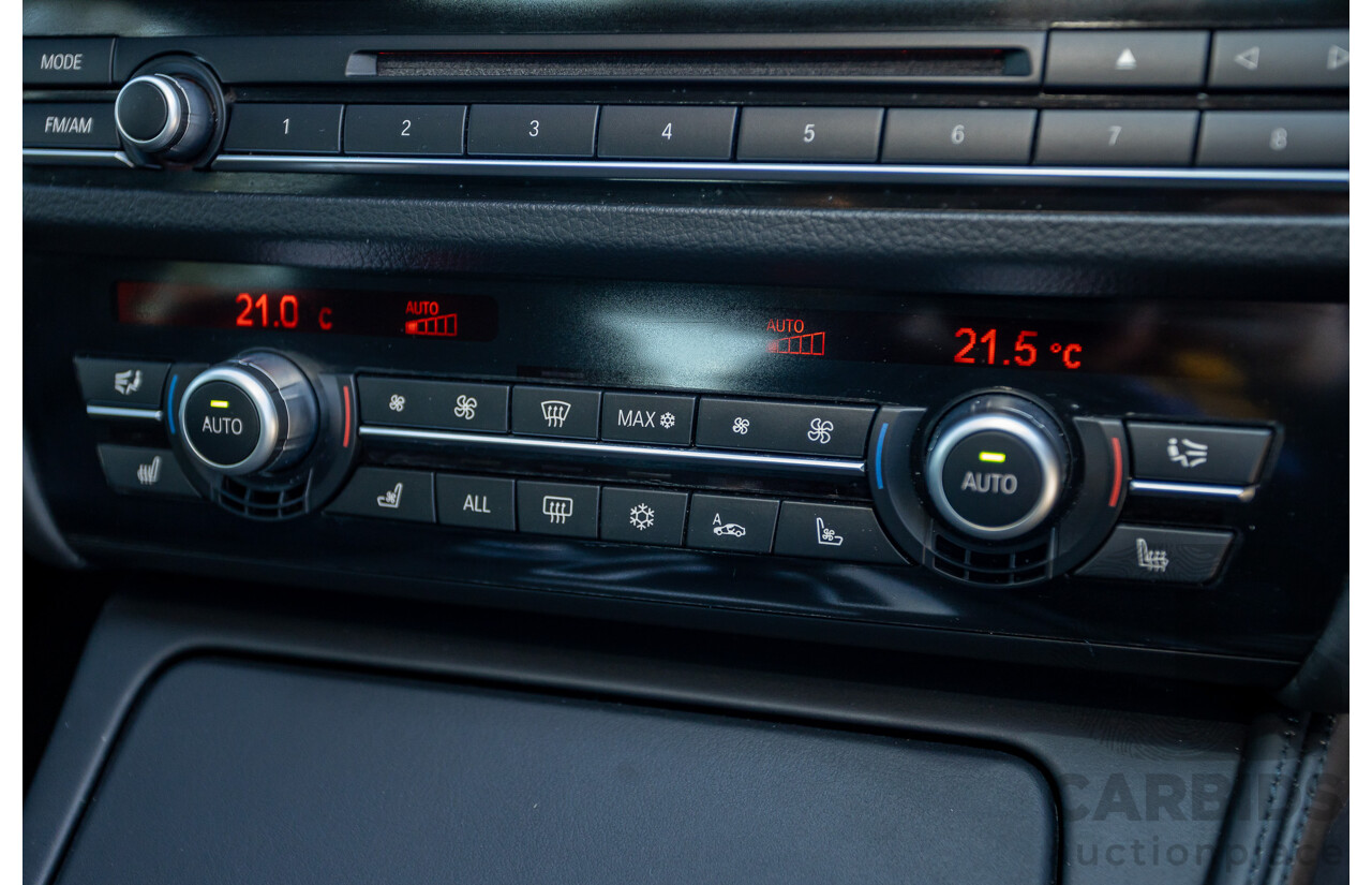 7/2012 BMW M5 F10 MY12 4d Sedan Sapphire Black Metallic Twin Turbo V8 4.4L