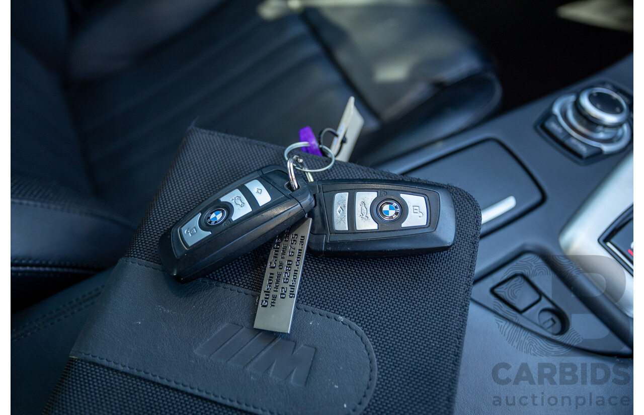 7/2012 BMW M5 F10 MY12 4d Sedan Sapphire Black Metallic Twin Turbo V8 4.4L