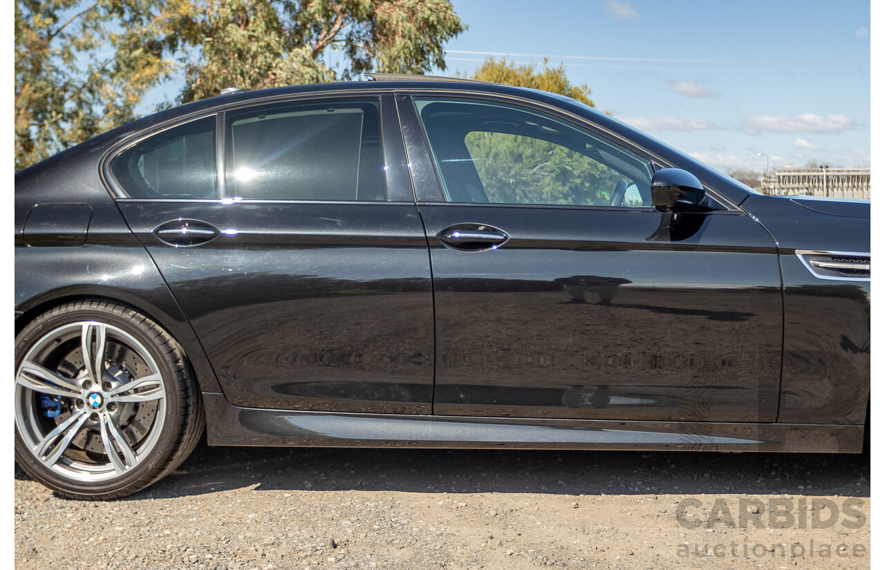 7/2012 BMW M5 F10 MY12 4d Sedan Sapphire Black Metallic Twin Turbo V8 4.4L