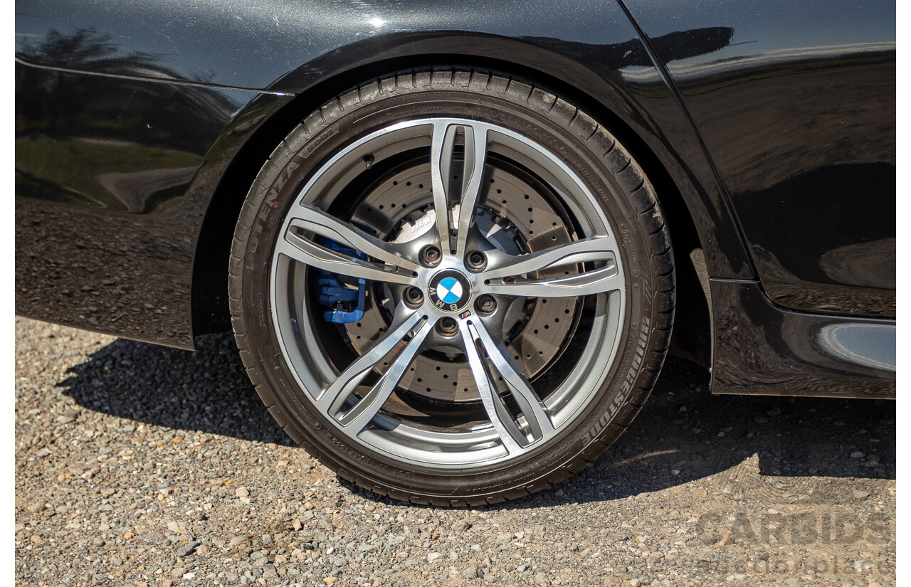 7/2012 BMW M5 F10 MY12 4d Sedan Sapphire Black Metallic Twin Turbo V8 4.4L