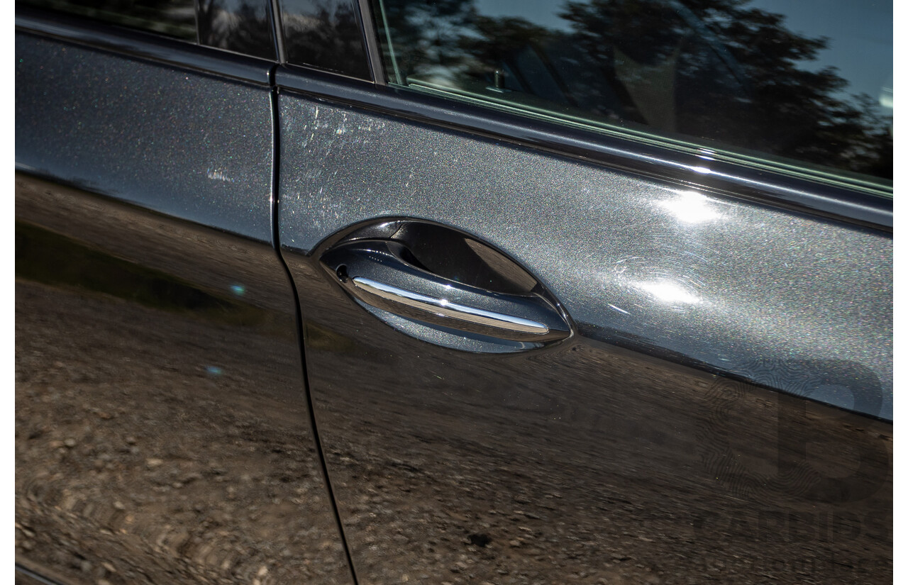 7/2012 BMW M5 F10 MY12 4d Sedan Sapphire Black Metallic Twin Turbo V8 4.4L