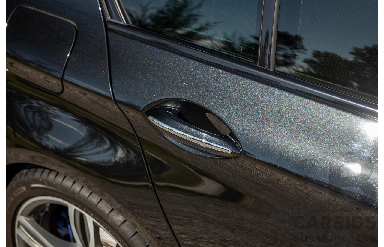 7/2012 BMW M5 F10 MY12 4d Sedan Sapphire Black Metallic Twin Turbo V8 4.4L