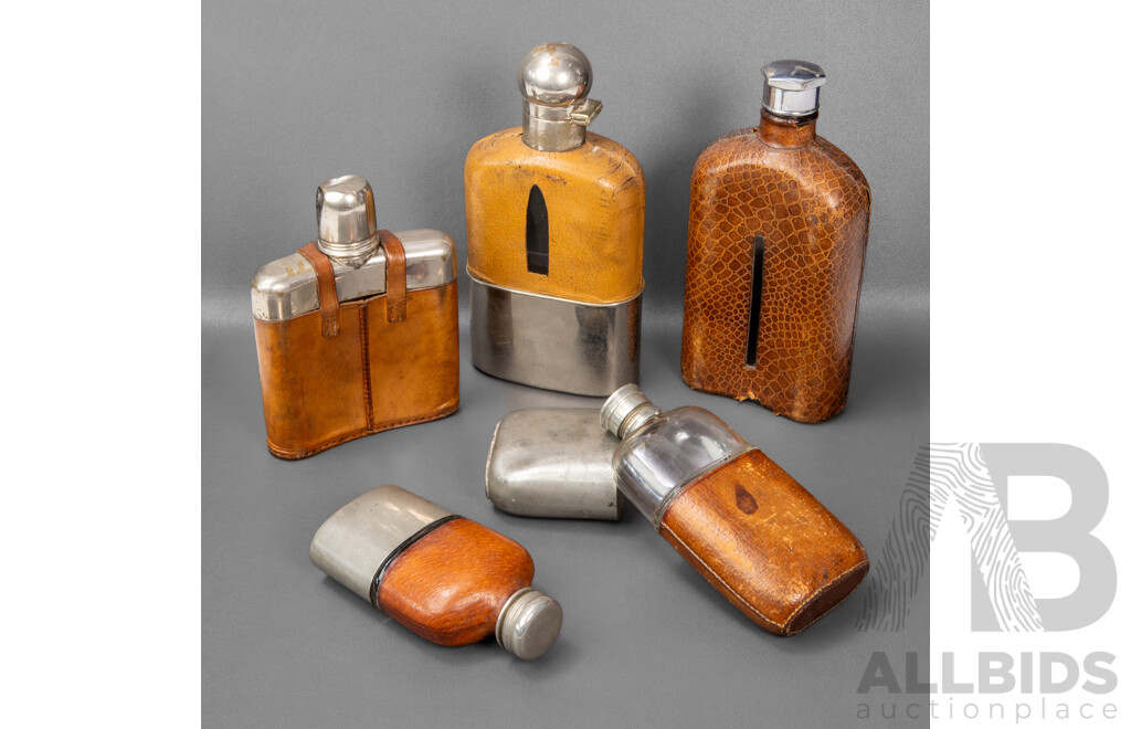 Collection of Five Leather and Pewter Hip Flaske