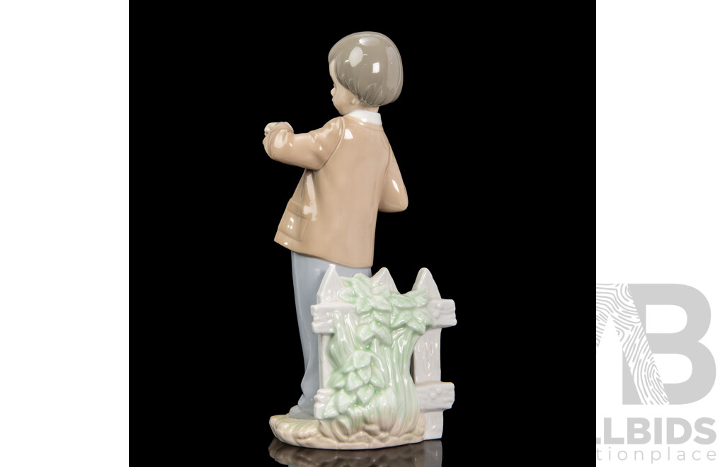 Glazed Ceramic 'Shes Late' Figure of a Young Boy by Nao
