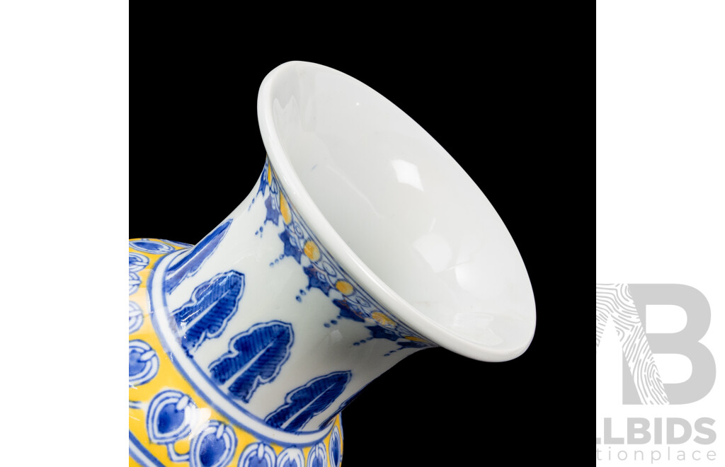 Pair of Unmatched Chinese Ceramic Vases