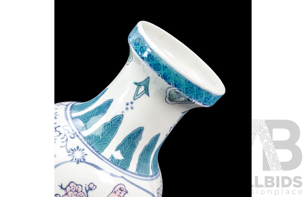 Pair of Unmatched Chinese Ceramic Vases