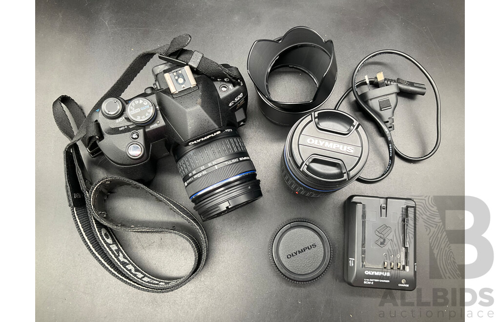 OLYMPUS E-520 DSLR Camera with Multiple Lenses and Accessories