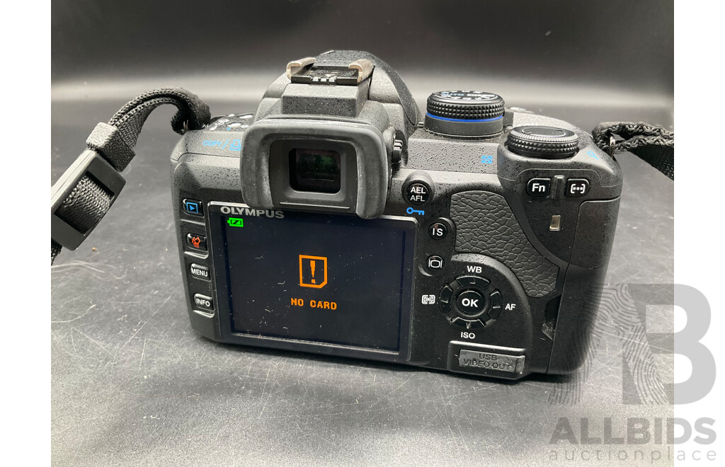 OLYMPUS E-520 DSLR Camera with Multiple Lenses and Accessories
