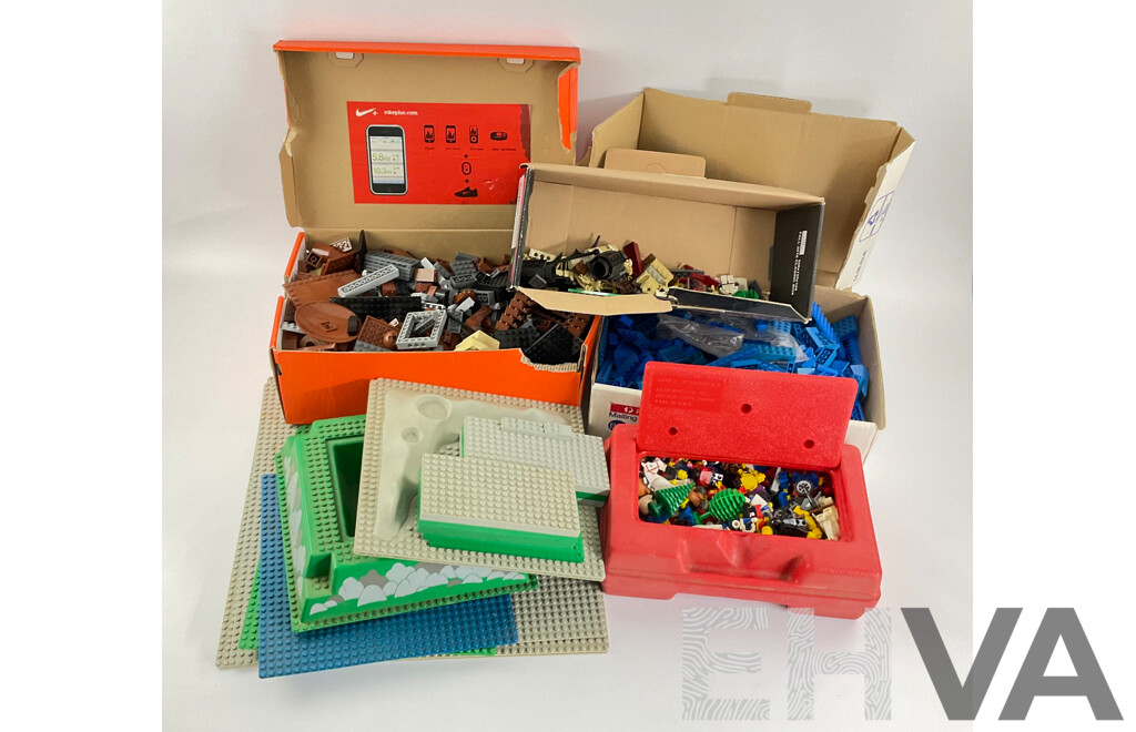 Collection of Vintage Lego Pieces Including Figures, Animals, Base Plates