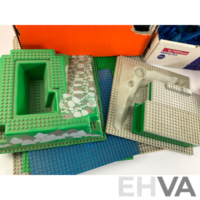 Collection of Vintage Lego Pieces Including Figures, Animals, Base Plates