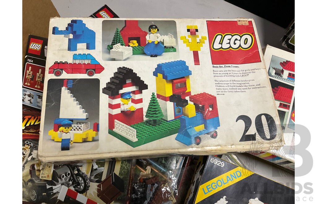 Collection of Assorted Lego Pieces and Boxes Including Star Wars Train, Instruction Manuals and More