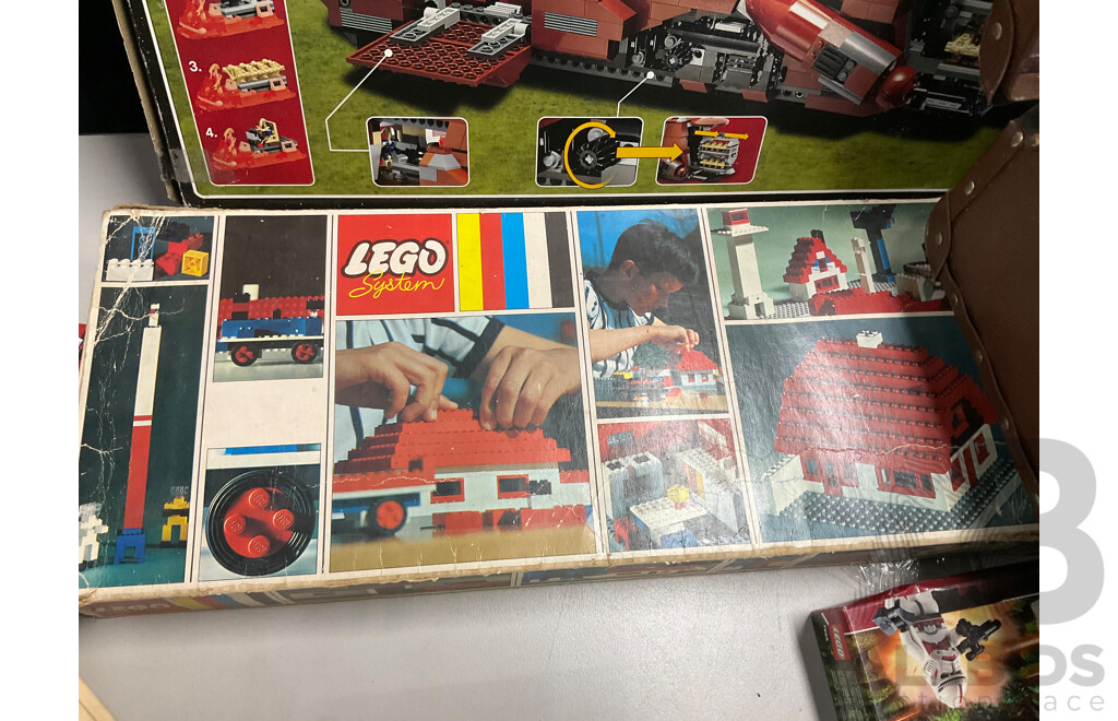 Collection of Assorted Lego Pieces and Boxes Including Star Wars Train, Instruction Manuals and More