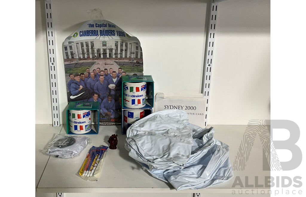 Collection of Sporting Goods Including Four 2003 Rugby World Cup Inflatable Footballs, Two Boxed Mugs, Boxed Sydney 2000 Mug and Pen Set, Twenty Five Olympic Poster Cards, 1996 Canberra Raiders Poster