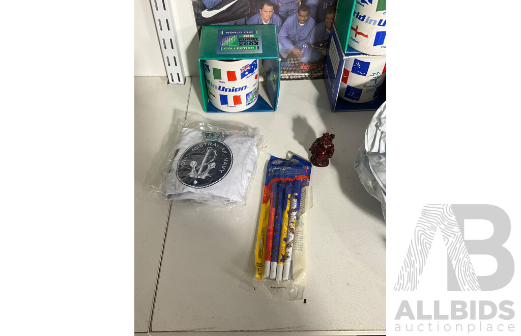 Collection of Sporting Goods Including Four 2003 Rugby World Cup Inflatable Footballs, Two Boxed Mugs, Boxed Sydney 2000 Mug and Pen Set, Twenty Five Olympic Poster Cards, 1996 Canberra Raiders Poster
