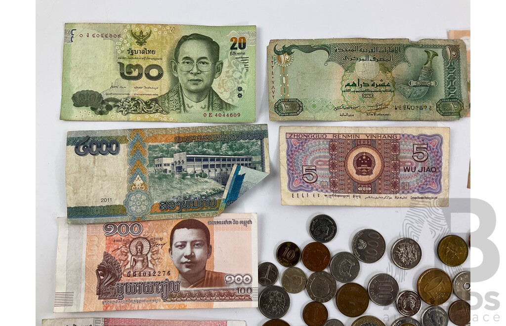 Collection of International Currency Including Switzerland 1944 Silver Two Francs, Thailand, Vietnam, Cambodia, UK, Indonesia, France, China