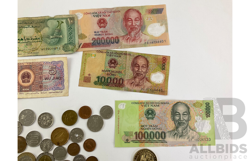 Collection of International Currency Including Switzerland 1944 Silver Two Francs, Thailand, Vietnam, Cambodia, UK, Indonesia, France, China