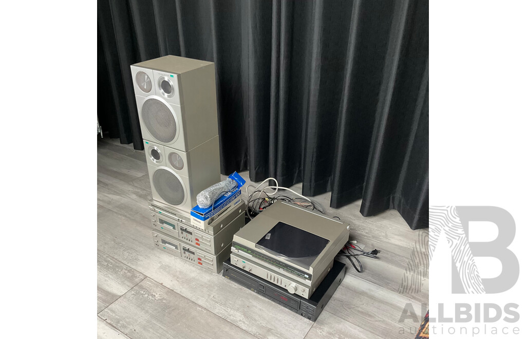 Vintage Sansui Stereo System Including AM7 Amplifier, TM7 Tuner, Two DM7 Cassette Decks, PM7 Turntable, Two SM7 2-Way Speakers with Yamaha EM-100 Echo Microphone