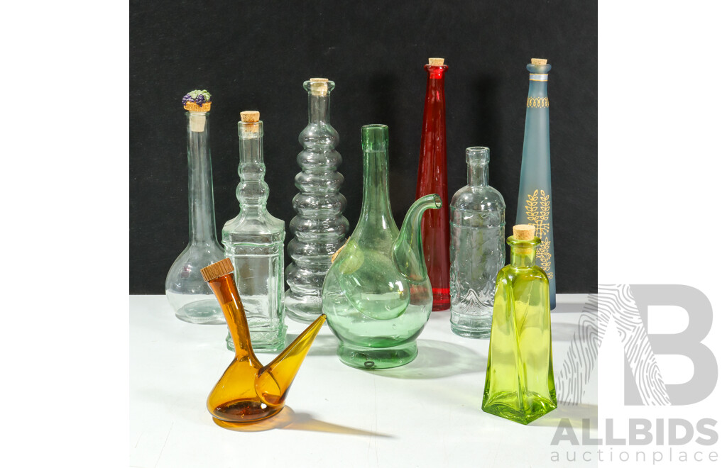 Collection of Various Glass Bottles