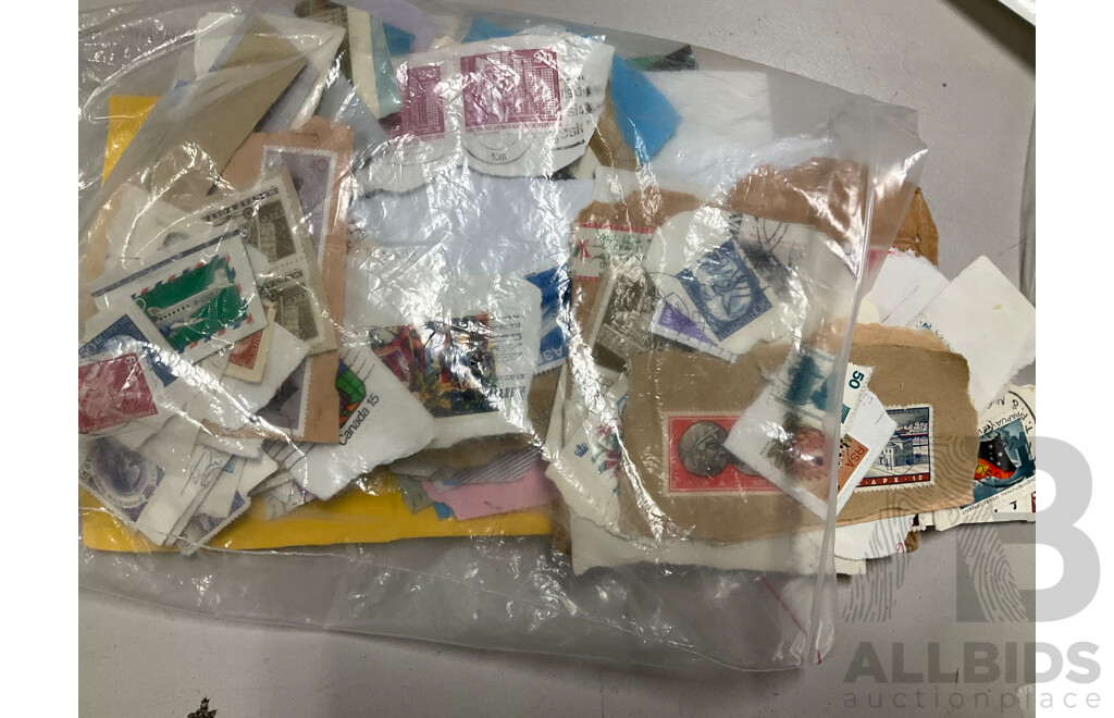 Collection of International Cancelled Stamps Including USA, New Zealand, Australia, UK, Germany, Malaysia, India, Romania, Italy and More - Approximately Two Kilograms