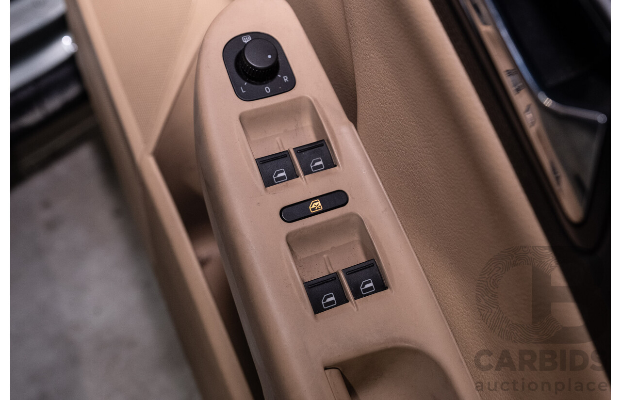 12/2006 Volkswagen Passat 2.0 TDI 3C 4d Sedan Granite Green Metallic Turbo Diesel 2.0L