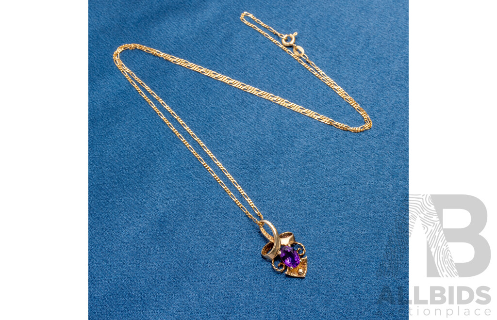 9ct Yellow Gold Oval Amethyst Pendant and Chain - 3.05gms
