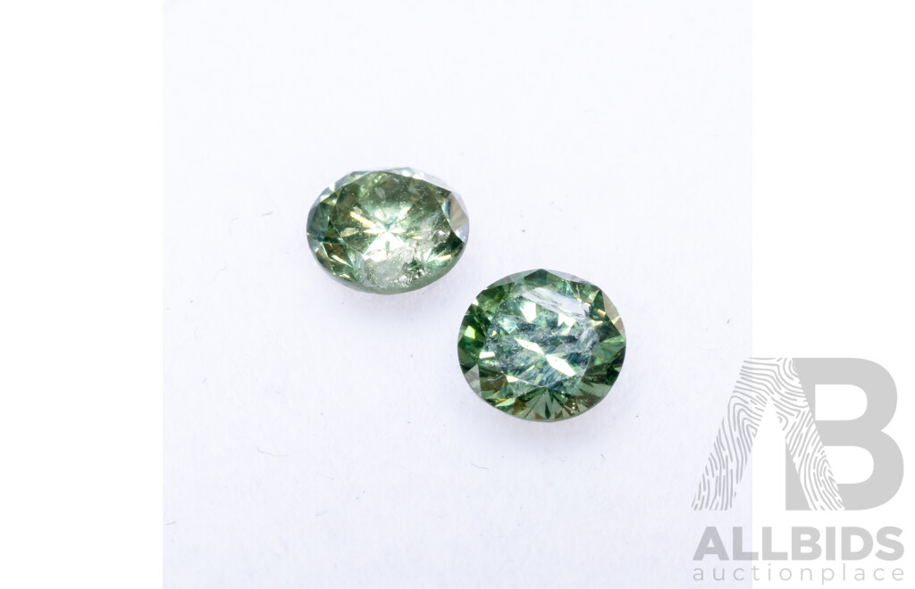 Pair of Round Brilliant Cut Green Diamonds - 0.60cts