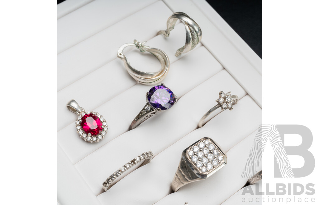 Collection of (6) Sterling Silver Rings, with a Pendant & Pair of Hoop Earrings, 22.62 Grams