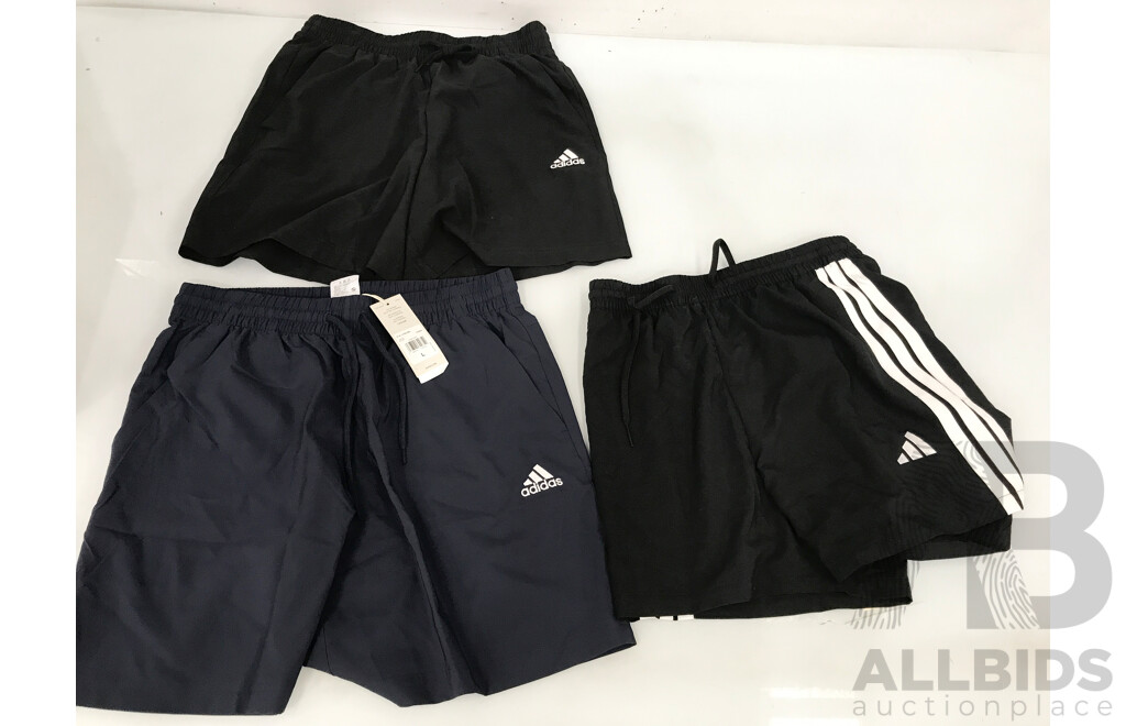 Assorted Adidas and Champion Shirts, Shorts, and Jogging Pants