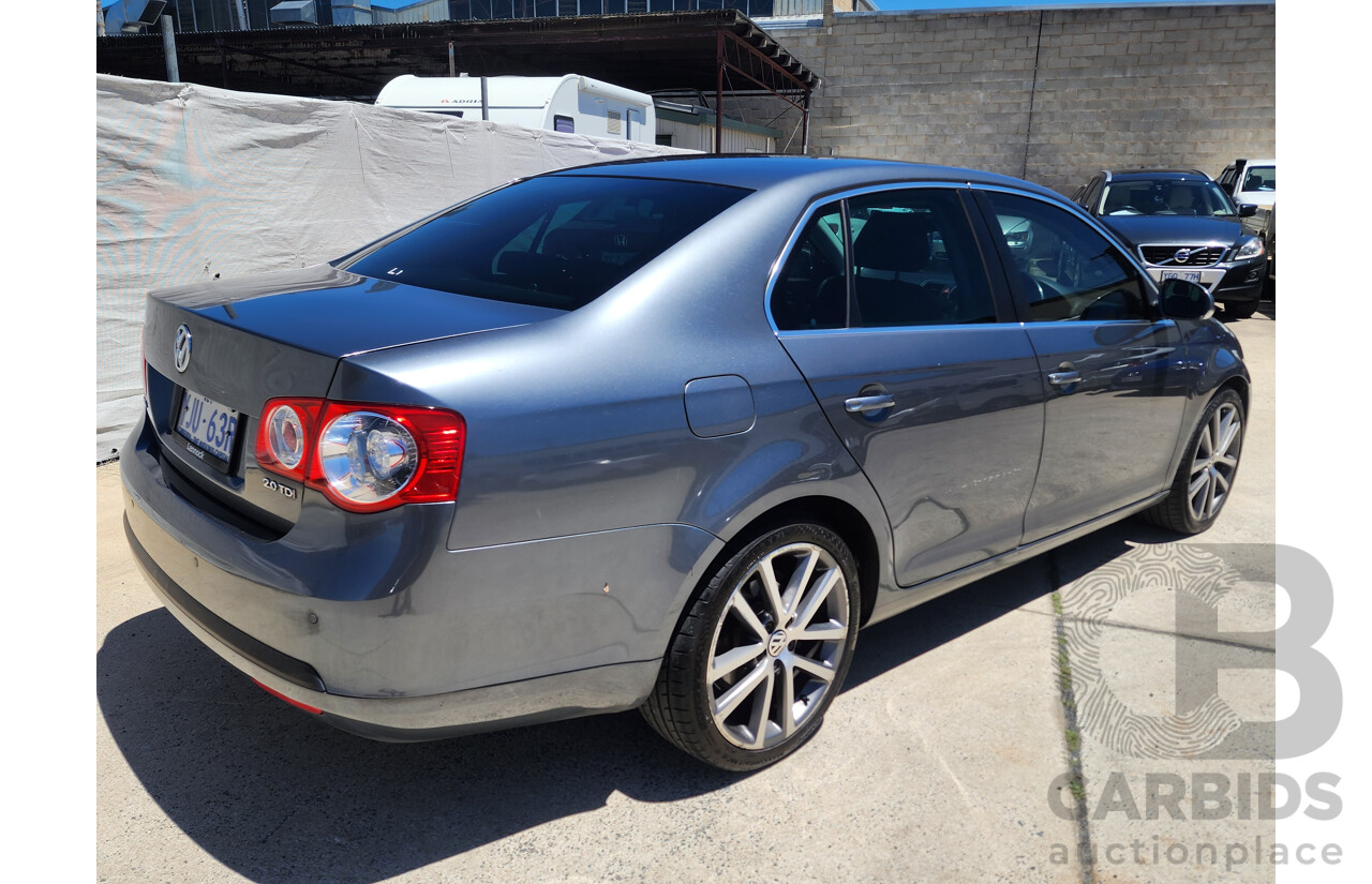 9/2010 Volkswagen Jetta 125 TDI Highline 1KM MY10 4d Sedan Grey 2.0L