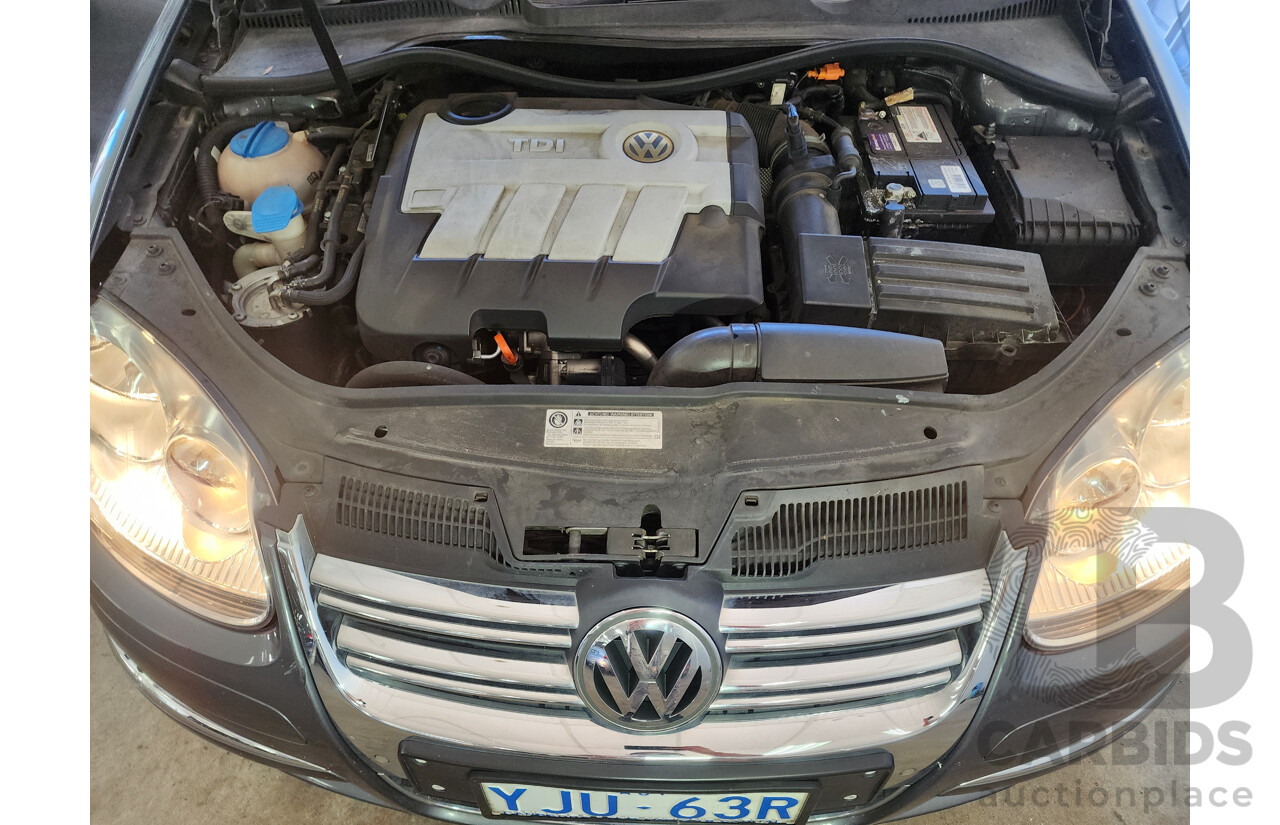 9/2010 Volkswagen Jetta 125 TDI Highline 1KM MY10 4d Sedan Grey 2.0L