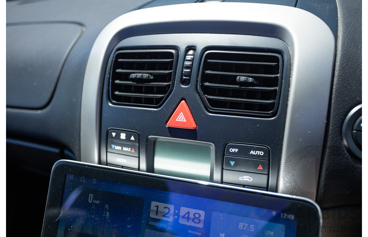 8/2005 Holden Commodore SS VZ Utility Heron White 5.7L V8